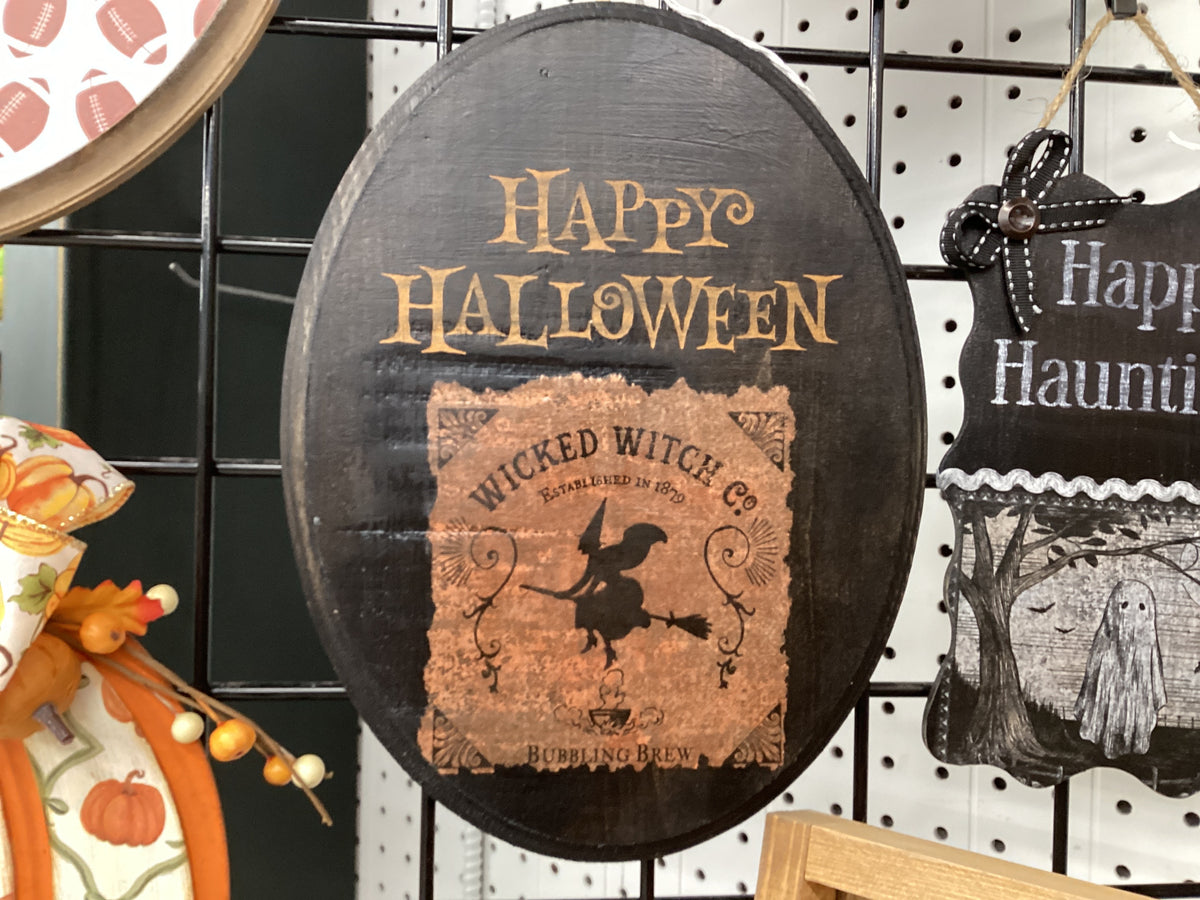 11.5” Oval orange witch sign