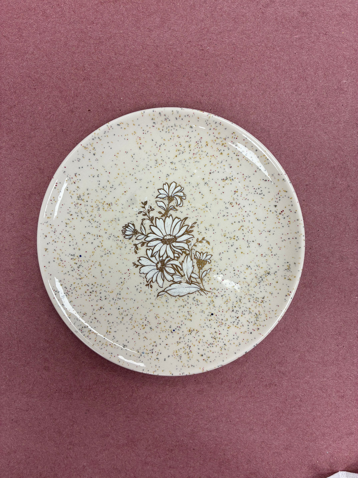 Glazed ceramic plate with gold decal